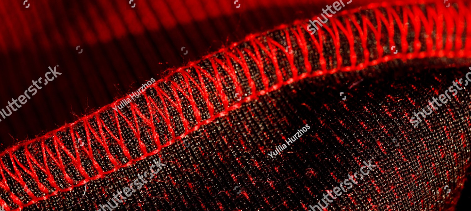 stock-photo-red-sportswear-closeup-top-view-seam-and-juncture-inside-out-breathable-knitwear-clothing-1393473143.jpg